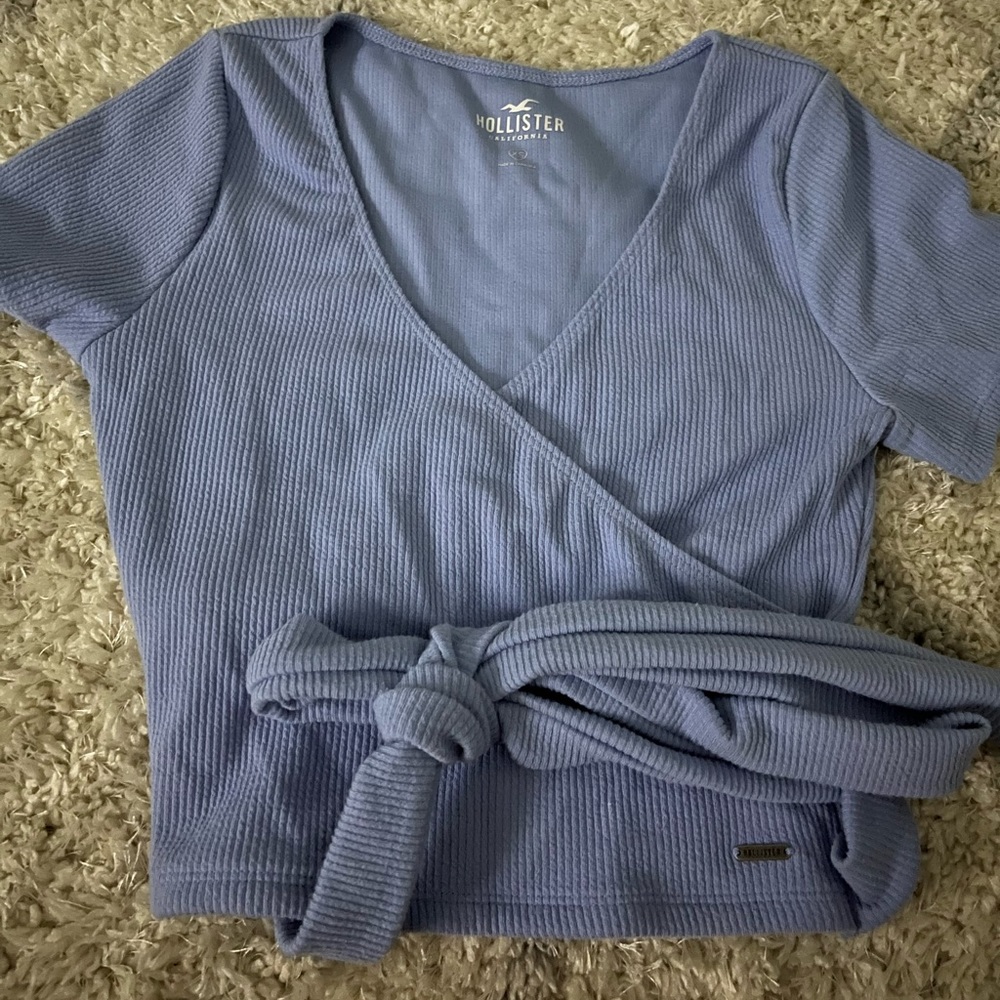 rarely used blue tight top